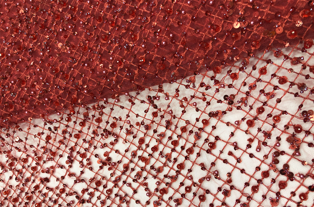 red beaded lace fabric